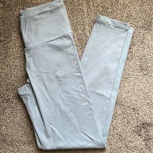 Small light blue Ryderwear scrunch bum leggings and XS sports bra
